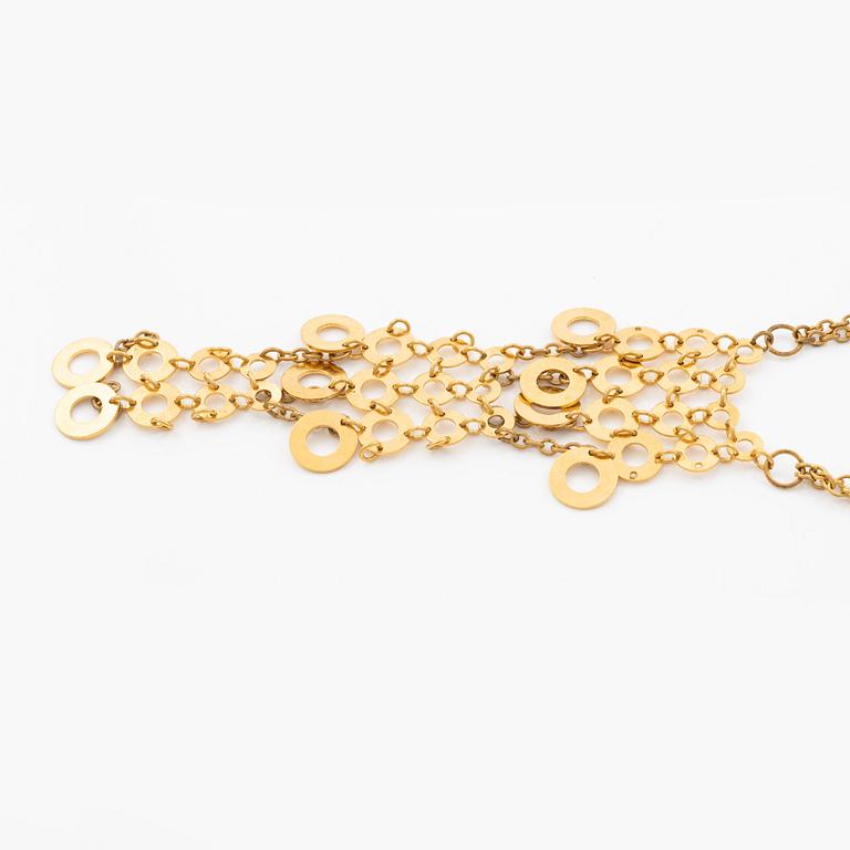 Siv Lagerström two necklaces in yellow metal.