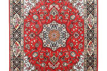 A carpet, Tabriz, part silk, c. 202 x 152 cm.