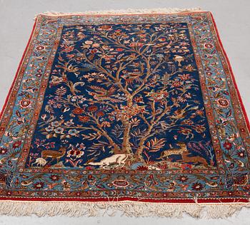 A carpet, semi-antique Qum, figural, ca 195 x 130 cm.