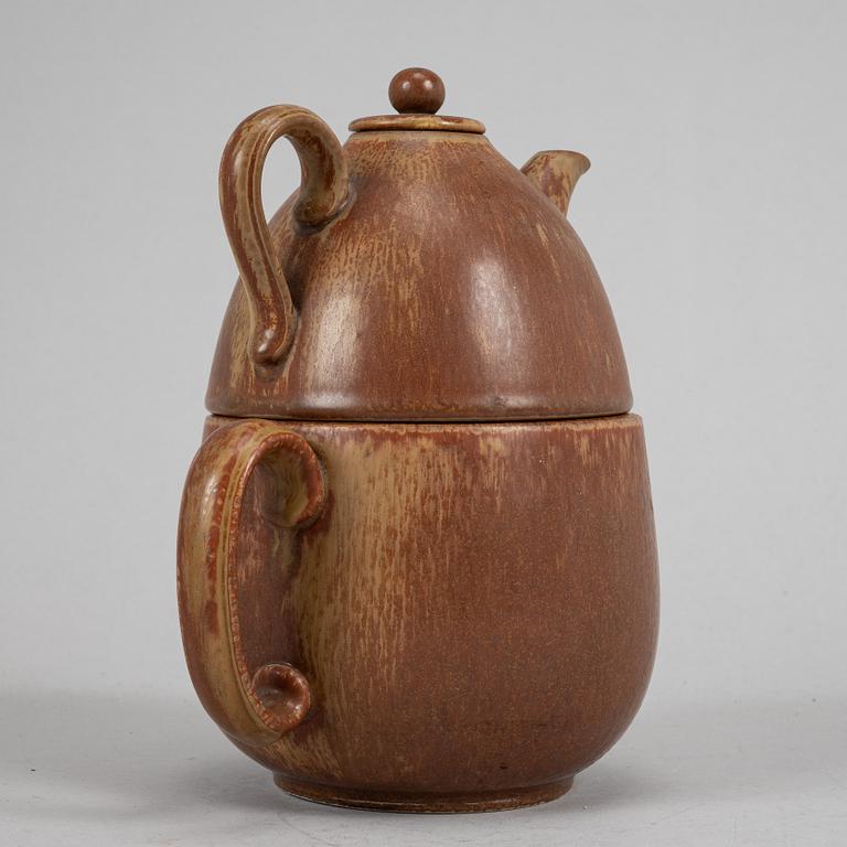 Tea pot, two bowls, two creamers, and a vase by Gunnar Nylund, stoneware, Rörstrand.