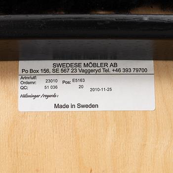 Yngve Ekström, a 'Lamino' easy chair with foot stool, Swedese 2010.