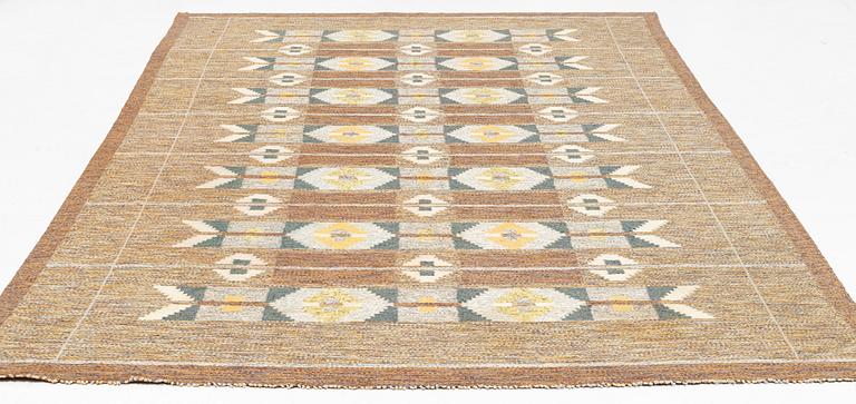 Ingegerd Silow, a carpet, flat weave, c 345 x 225 cm, signed IS.