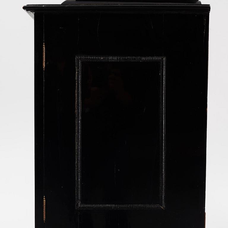 A South-German Baroque ebonized collector's cabinet on stand, circa 1700.