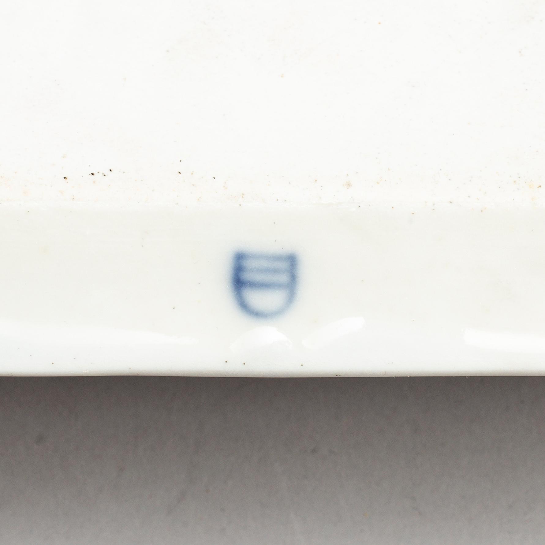 A group of four porcelain tea and coffe service, Germany,  19th century.