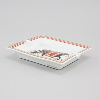 a porcelain ashtray.