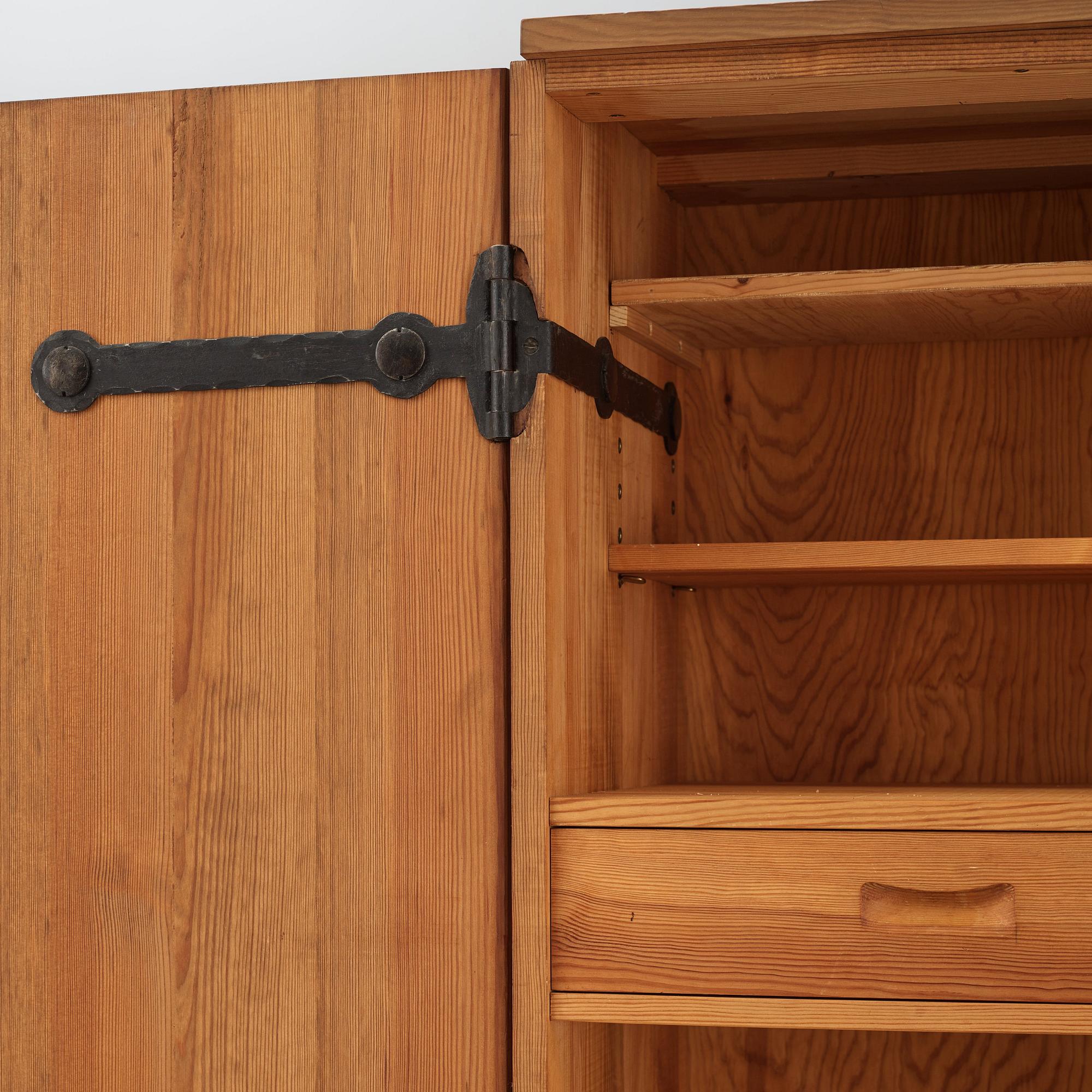 Axel Einar Hjorth, a stained pine "Lovö" cabinet, Nordiska Kompaniet, Sweden 1930's.