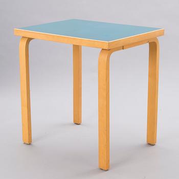 A mid-20th Century table, Artek.