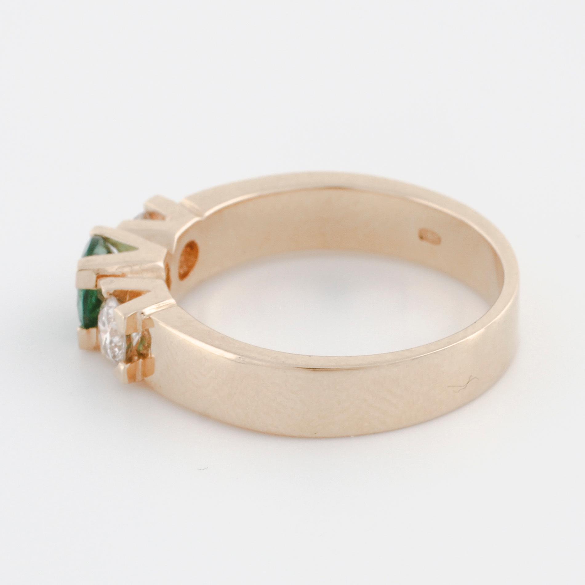 A green tourmaline rand brilliant cut diamond ring.