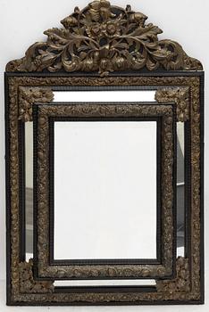 A Baroque style mirror, circa 1900.