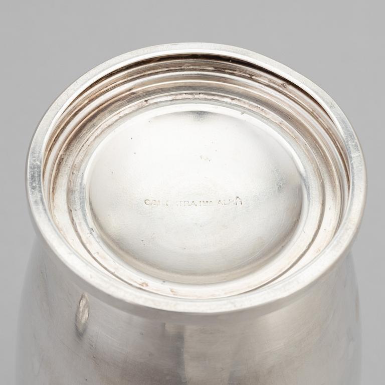 A silver plated shaker, C.G. Hallberg and a set of twelwe cocktail glasses, GAB, second half of the 20th Century.
