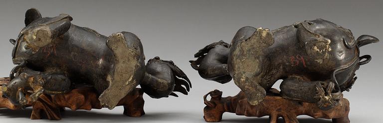 A pair of patinated bronze censers, 19th cent.