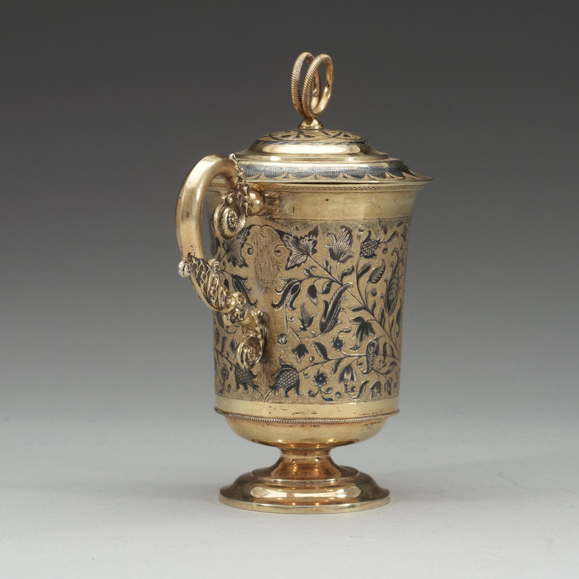 A Russian 19th century silver-gilt and niello cup and cover, un identified makers mark Moscow 1850's.