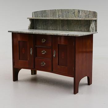 KOMMOD, 1900-talets första hälft.