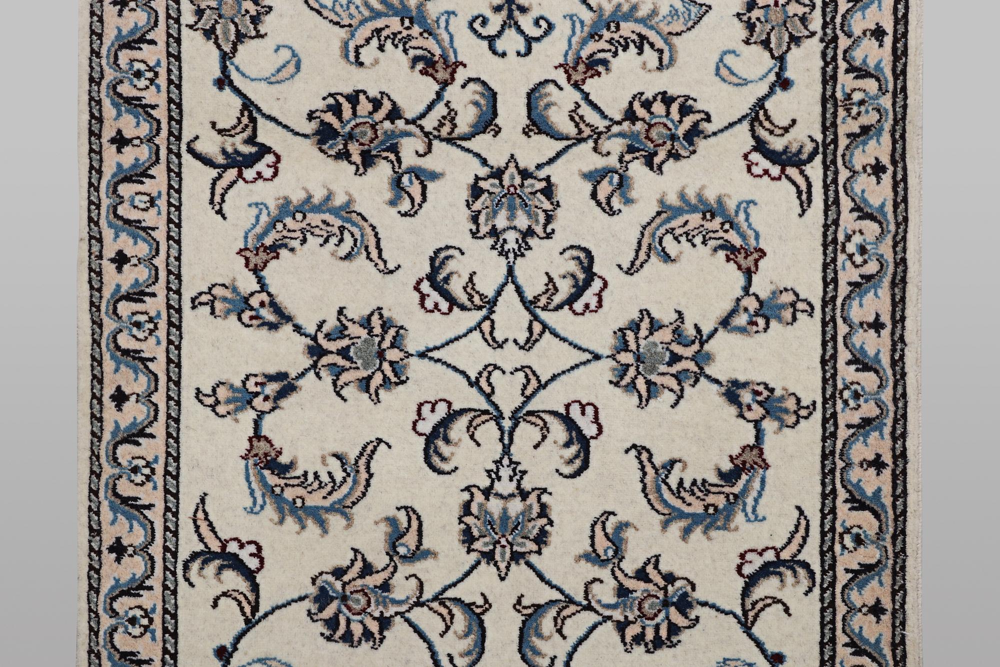 A runner carpet, Nain, part silk, ca 192 x 80 cm.