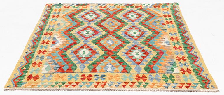 A Kilim rug approximately 190 x 150 cm.