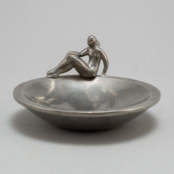 a pewter plate by Firma Svenskt Tenn Stockholm, 1928.