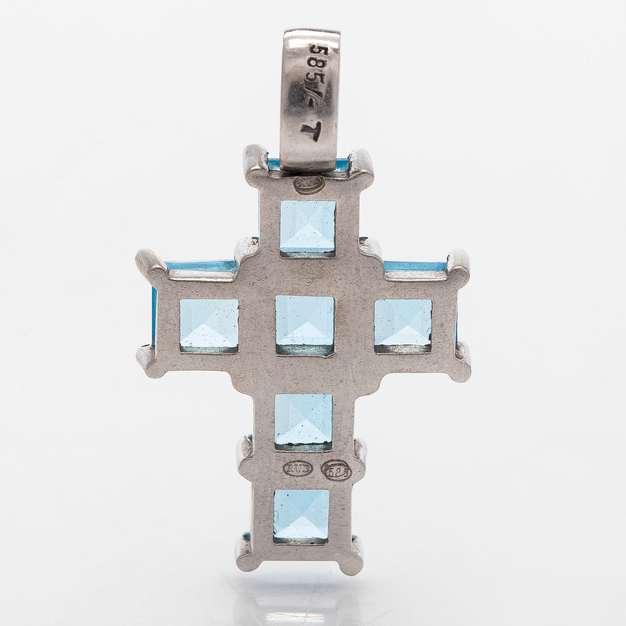 Hänge i form av kors, 14K vitguld med topaser.