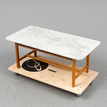 JOSEF FRANK, a model 2125 marble top coffee table from Svenskt Tenn.