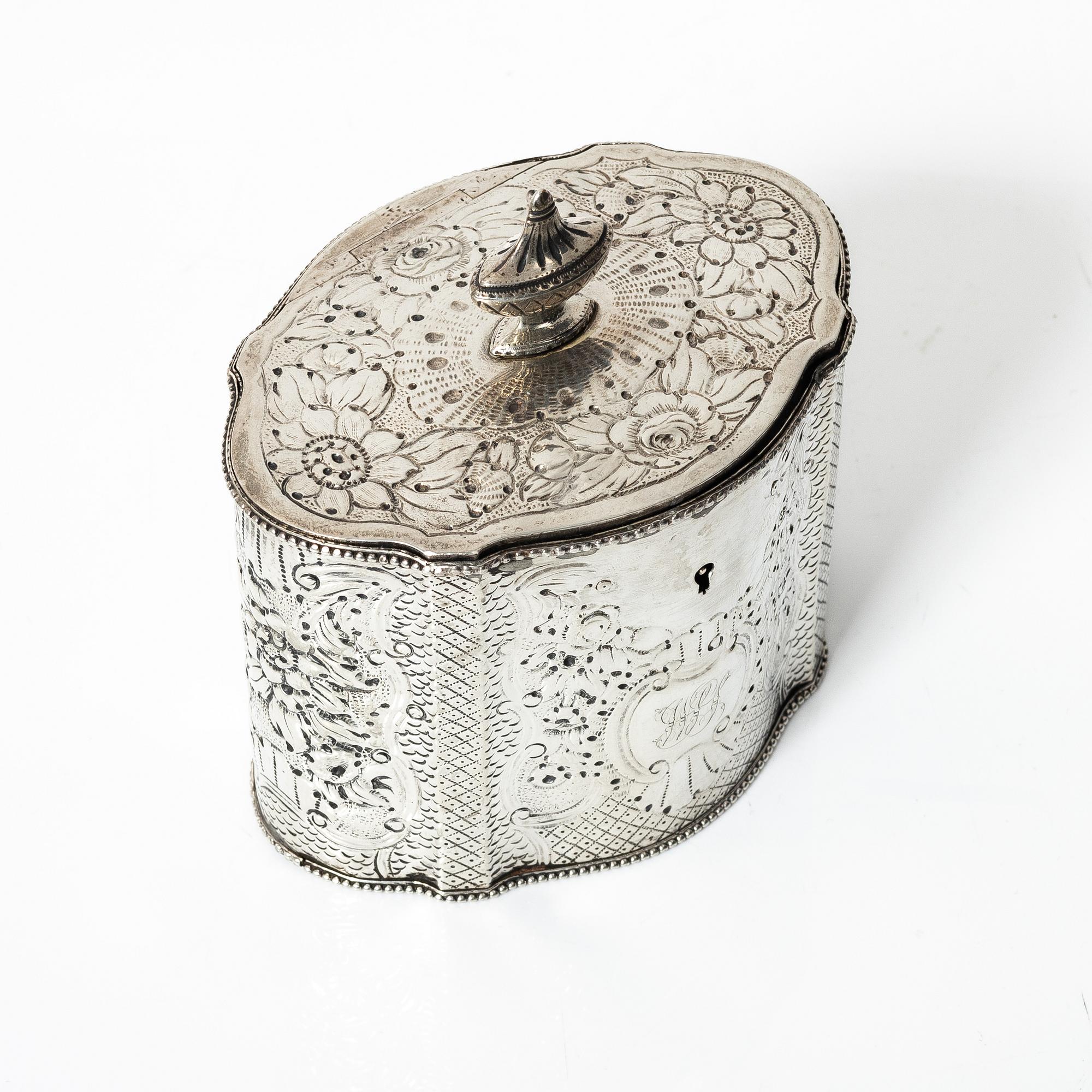 An English silver tea caddy, marks of Aaron Lestourgeon,  London, England 1779.