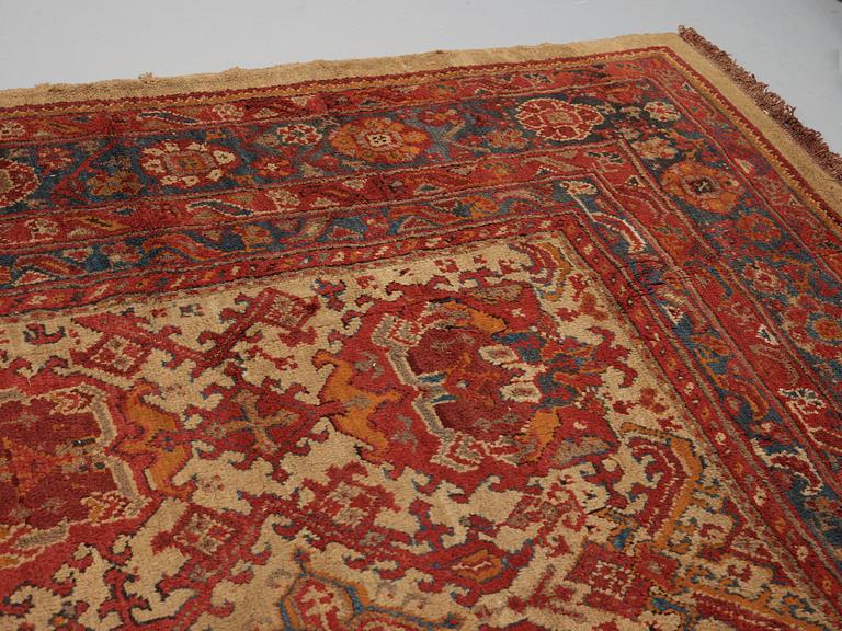 A CARPET. An antique Ushak. 554,5 x 480 cm.