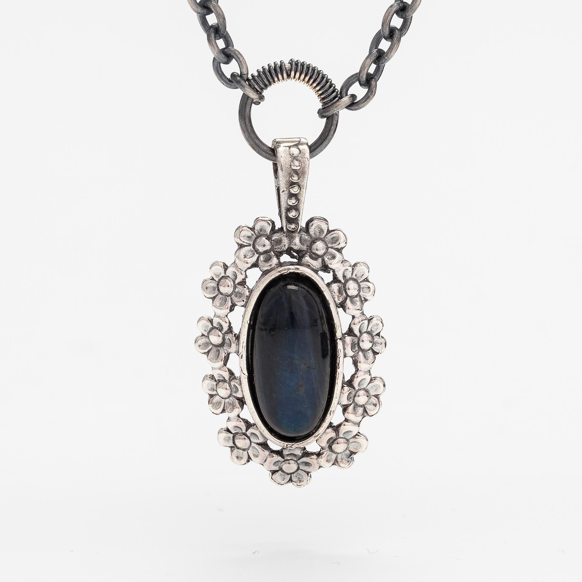 Jorma Laine, A silver necklace "Lemmikki" witha spectrolite. Turun Hopea, Turku.