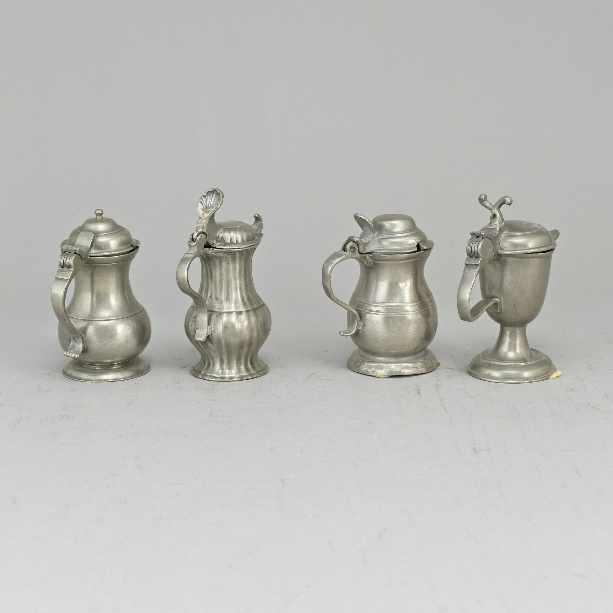 Eight pewter mustard pots, 18th/19th century.