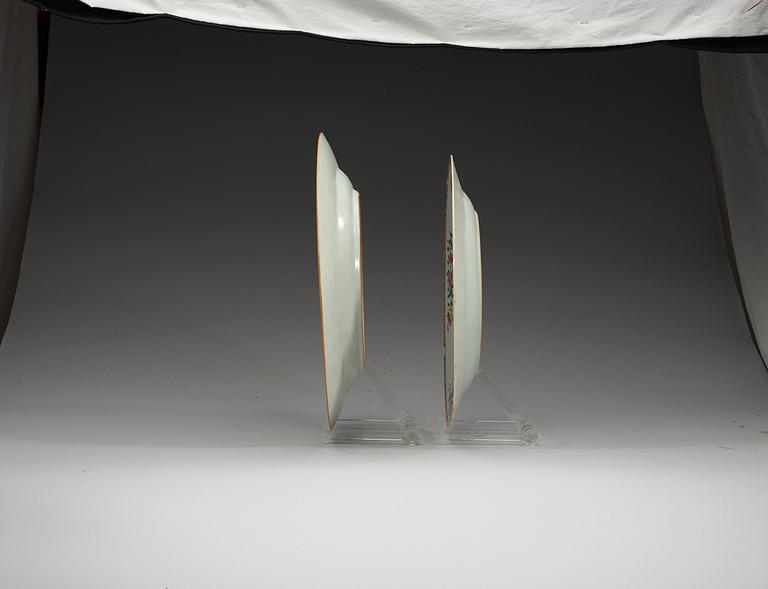 Two large famille rose 'double peacock' serving dishes, Qing dynasty, Qianlong (1736-95).