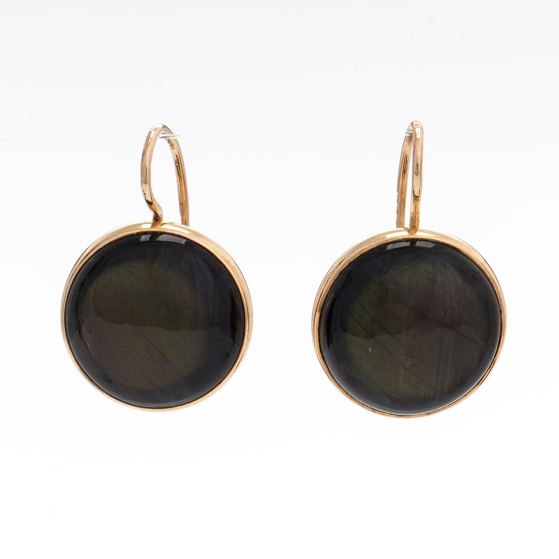 Elis Kauppi, a pair of 14K gold earrings with spectrolite. Kupittaan Kulta, Turku.