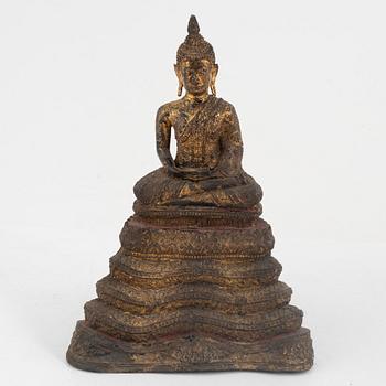 A gilt bronze Rattanakosin Buddha on a Naga throne, Thailand, 19th Century.