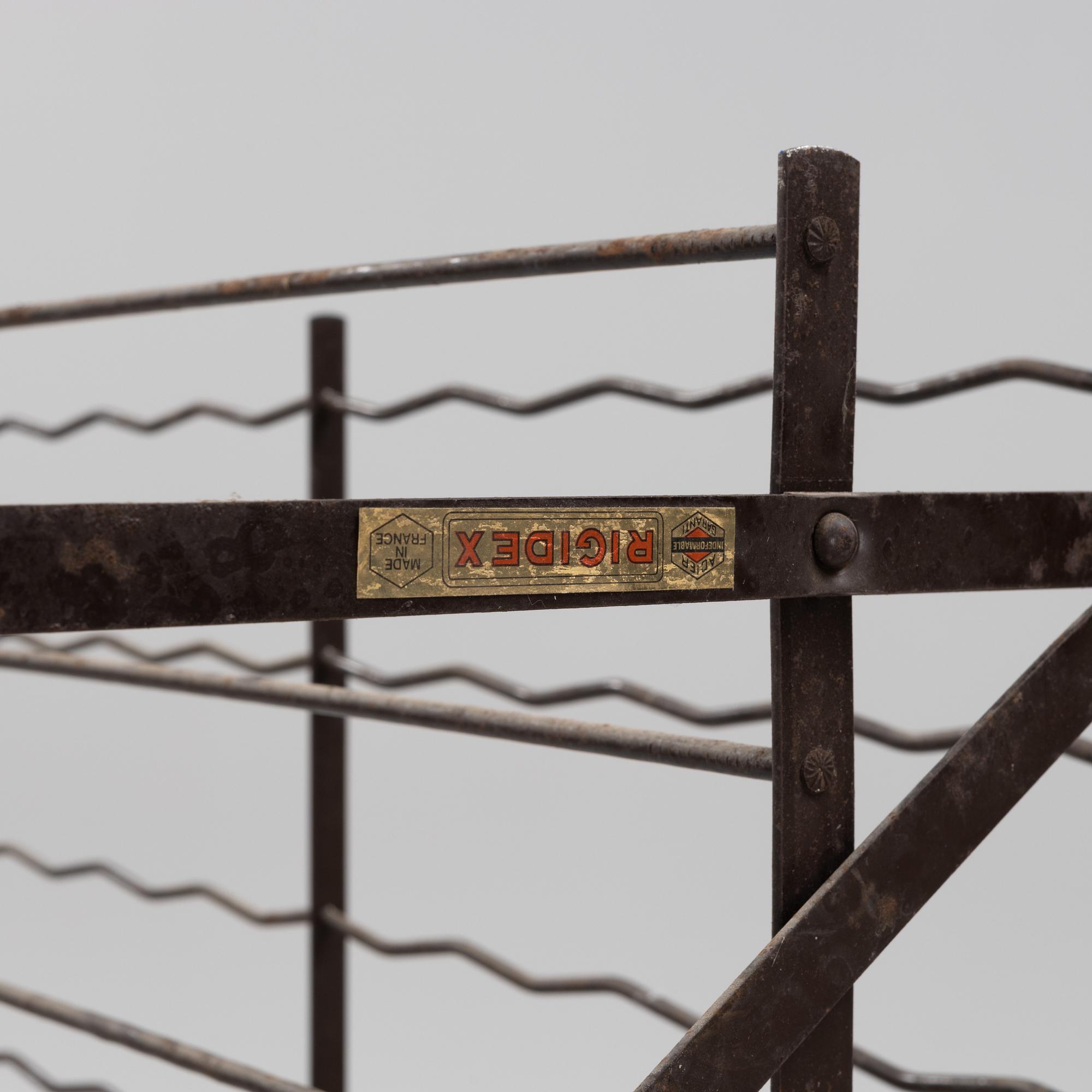 A Rigidex iron wine rack, France.