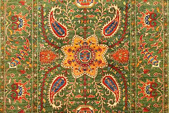 A Kazak carpet, c. 304 x 205 cm.