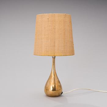 A table light manufactured by Idman from the mid 20th century.