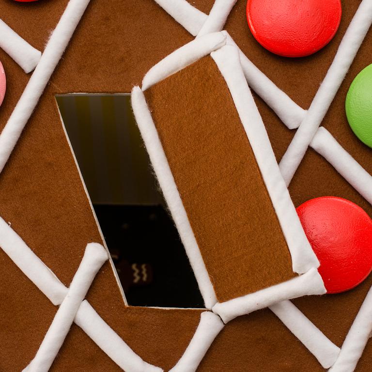 A gingerbread house made by JoAnn Tan Studio for NK 2016.