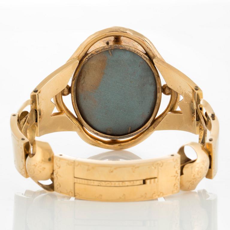 An 18K gold bracelet with an 18th century miniature portrait of Jeanne de Nesle, according to engraving.