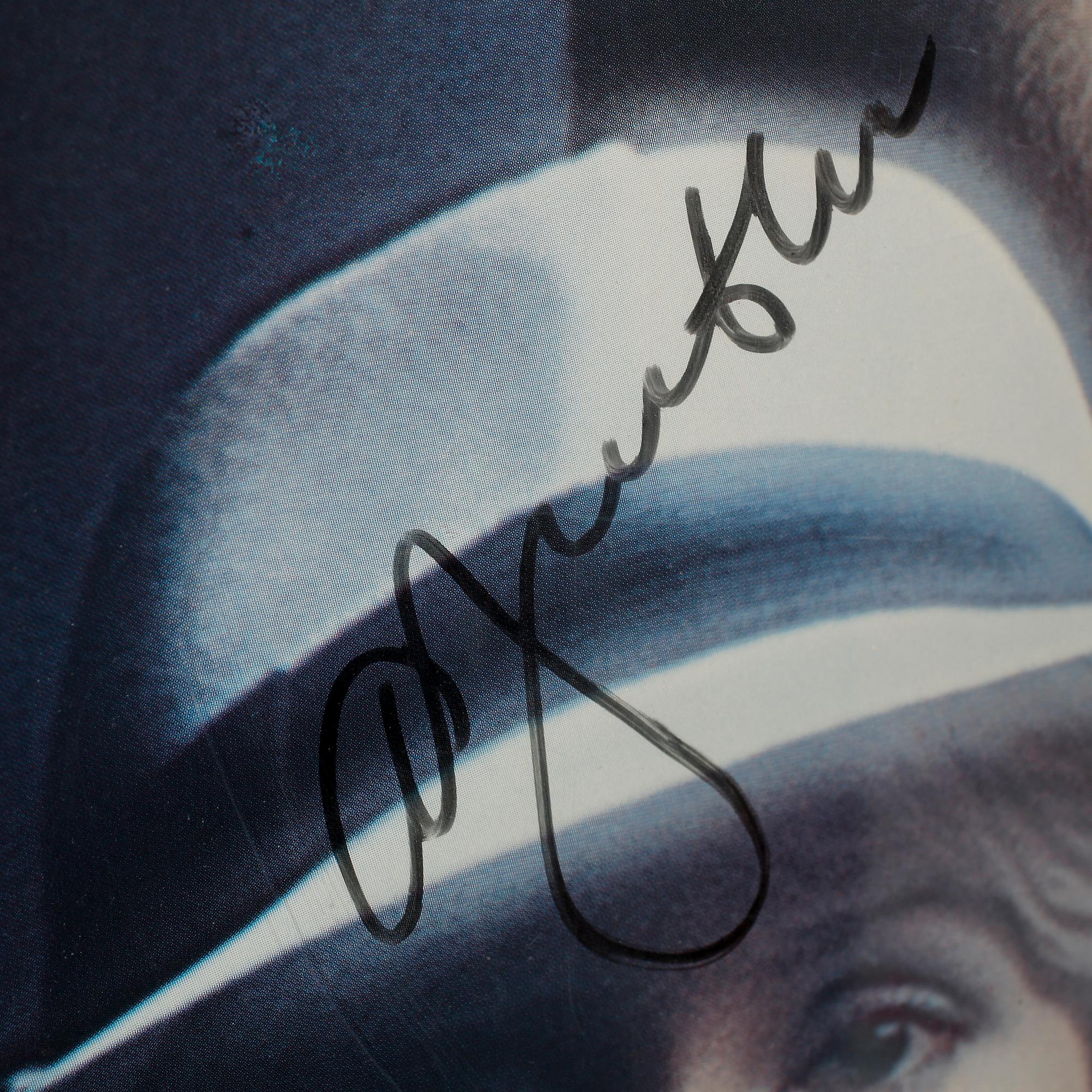 A poster signed by "ABBA".