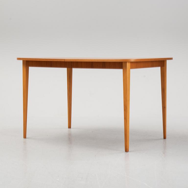 a 1950's/60's teak dining table.