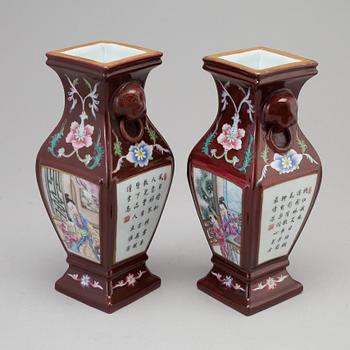 A pair of Chinese 20th century famille rose vases.