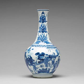 580. A Transitional blue and white bottle vase, 17th Century.