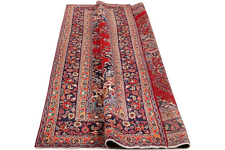 A carpet, Sabzewar, c. 338 x 243 cm.