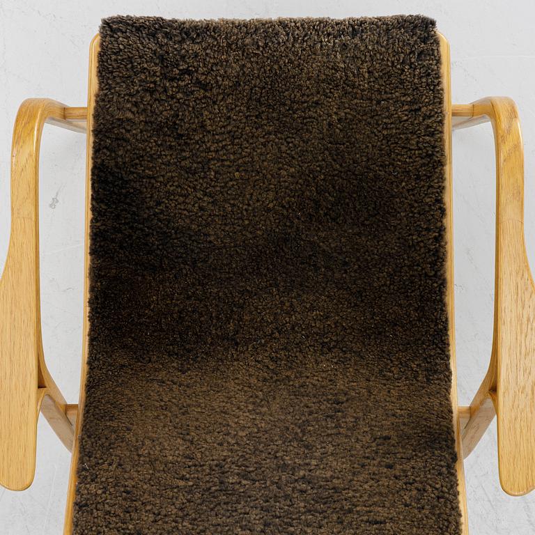 Yngve Ekström, a 'Lamino' armchair,  Swedese, 21st century.