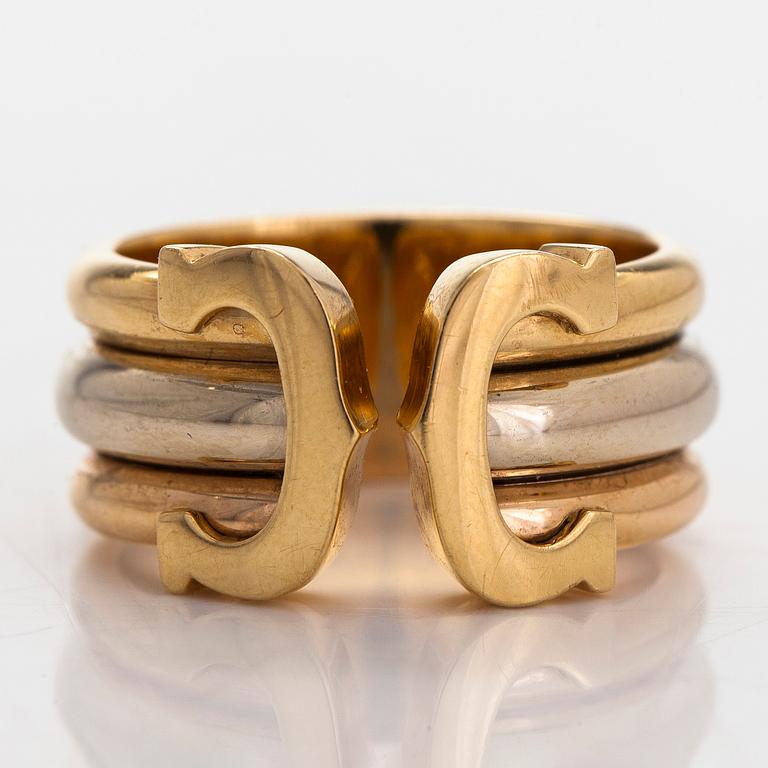 Cartier, an 18K yellow and white gold 'Double C' ring.