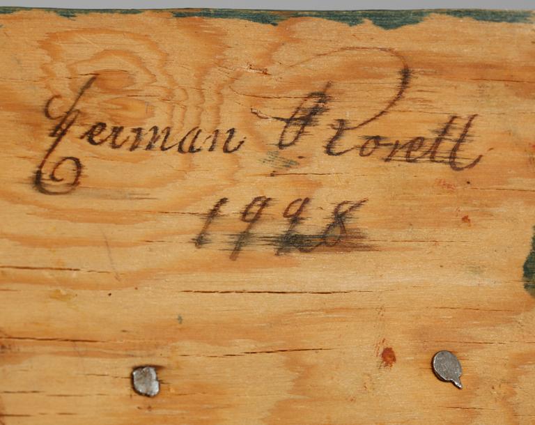 HERMAN ROSELL, ett par,  träskulpturer, en av dem signerad och daterad 1928.