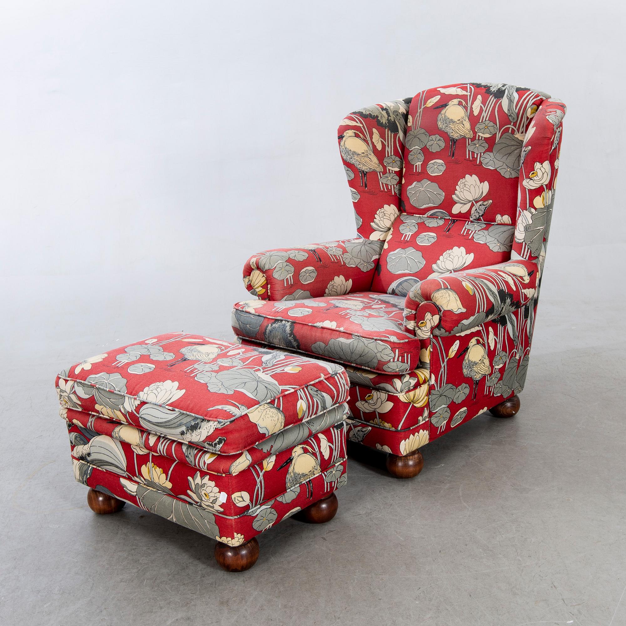 An easy chair with stool later part of the 20th century.
