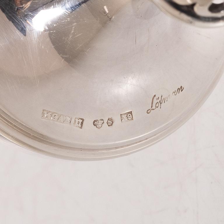 Eric Löfman, A set of twelve silver vodka glasses, KG Markströms, Uppsala 1972.