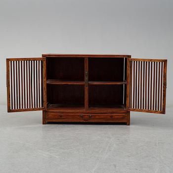 A stained second half of the 20th century cupboard from south-east Asia.