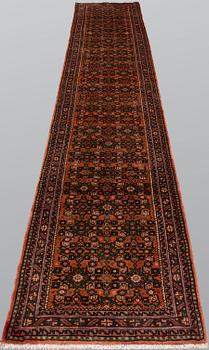 A Hosseinabad runner, approx. 397 x 84 cm.