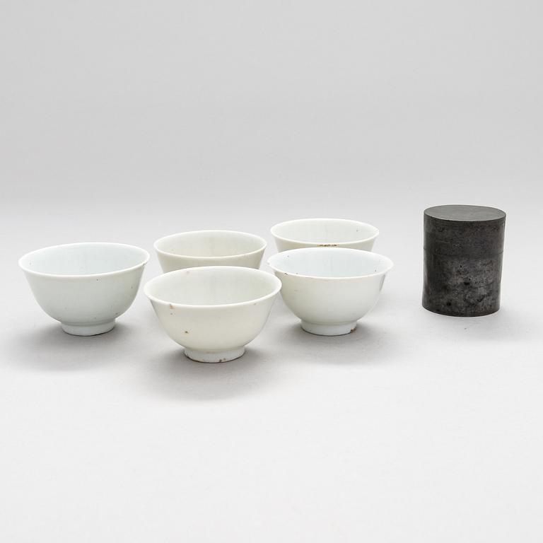 Five teacups and a tea caddy from first half of 20th century.