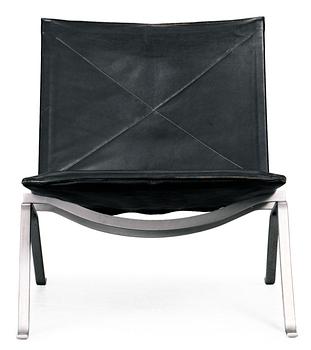 961. A Poul Kjaerholm "PK-22" black leather and steel easy chair, E Kold Christensen, Denmark 1960's. Maker's mark in the steel frame.