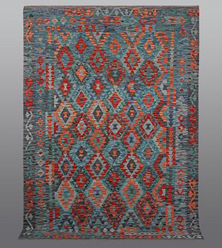 A rug, kilim, ca 252 x 179 cm.