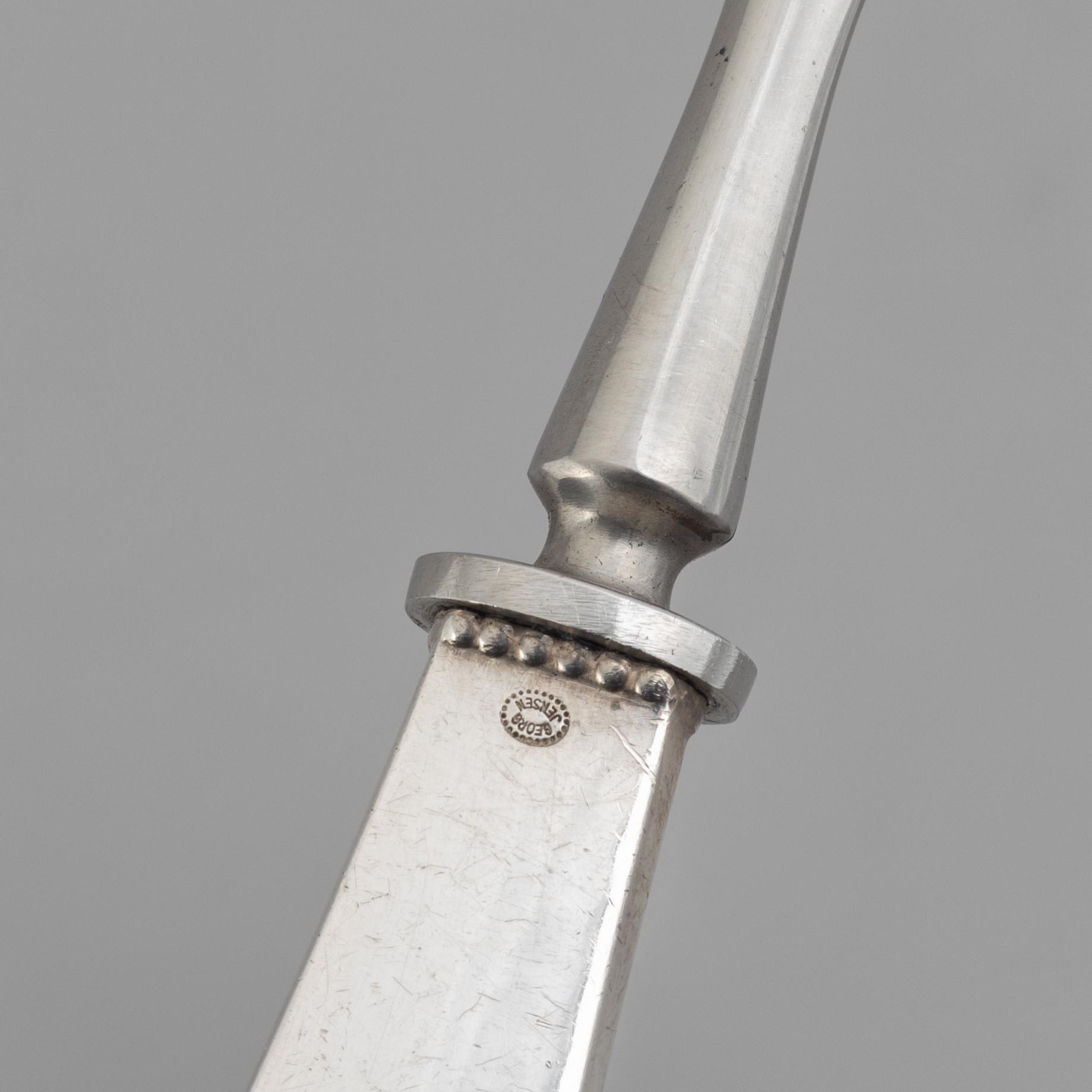 Georg Jensen, ostkniv samt osthyvel, silver,"Kugle/Beaded", Köpenhamn, Danmark efter 1950.